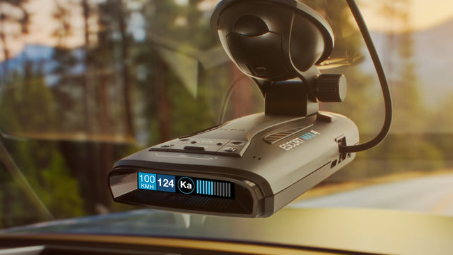 Escort MAX 4 portable radar detector attached to windshield