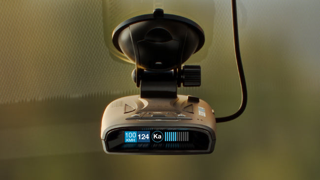 Escort MAX 4 portable radar detector attached to windshield